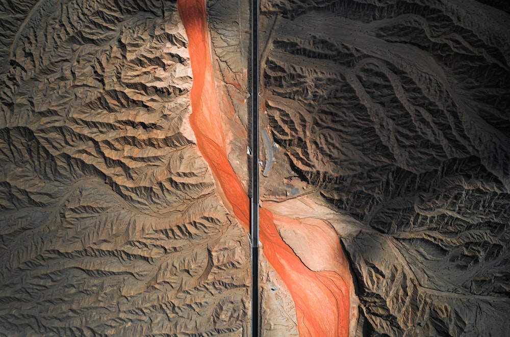 an aerial view of a road in the desert