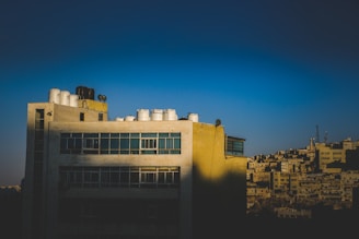 A government building with a water filtration setup outside.