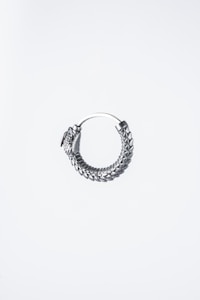 a pair of silver hoop earrings on a white background