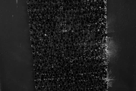 Close-up of graphenated carbon nanotubes under a microscope showing intricate nanostructures