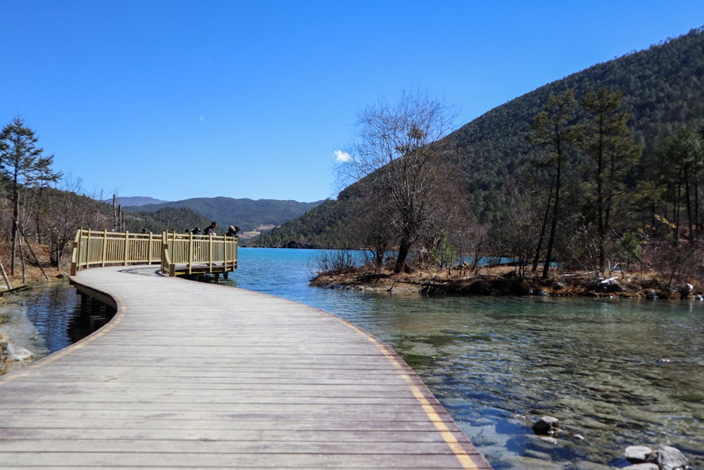 a wooden bridge over a body of water