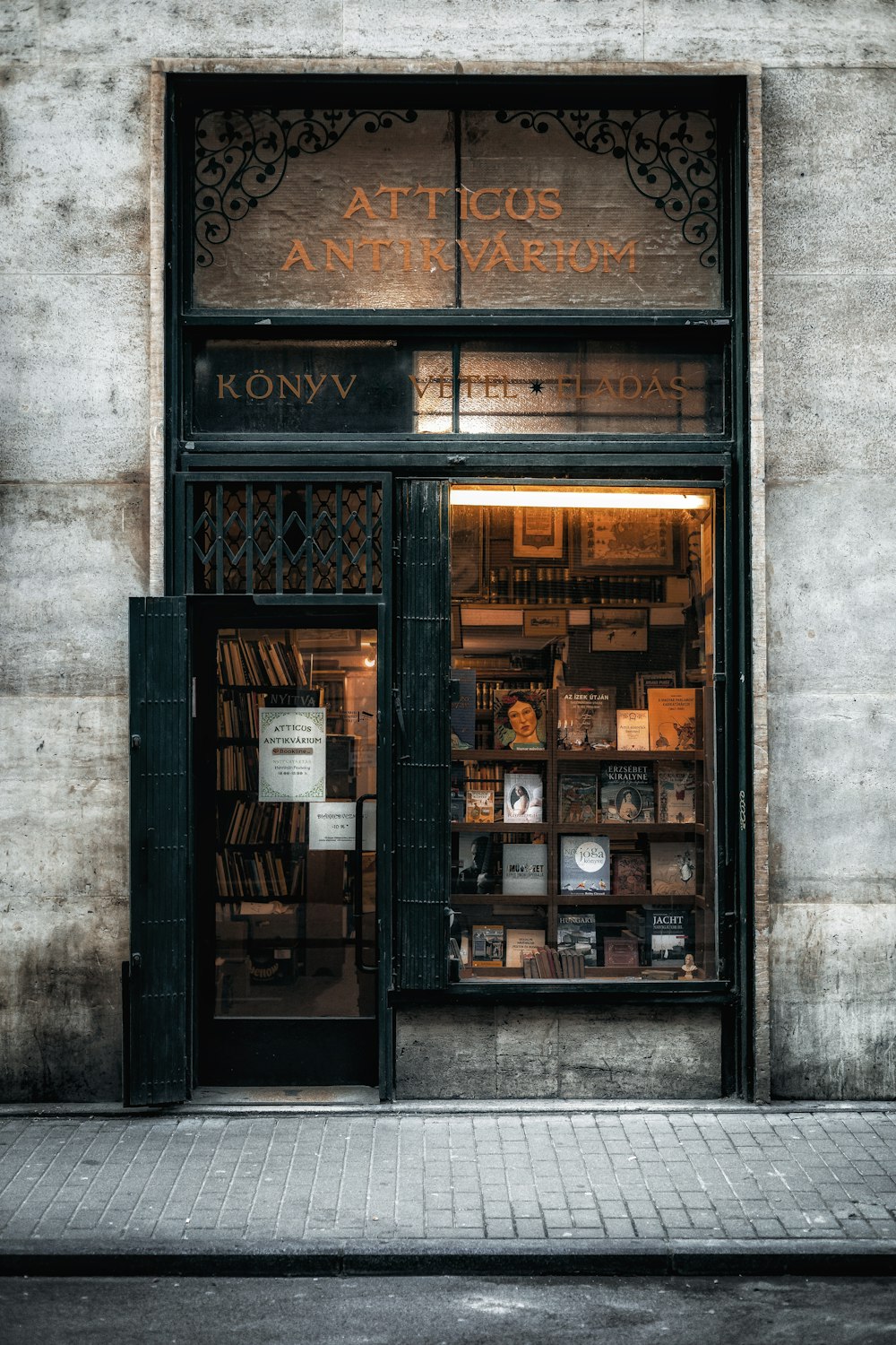 a store front with a sign that says attic anniversary