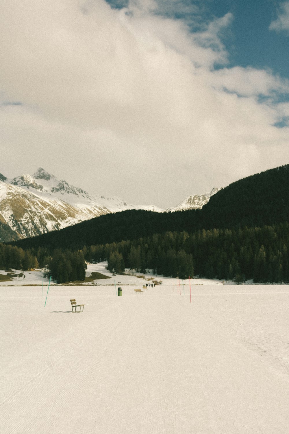 a person riding skis on a snowy surface