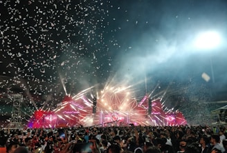 Crowd enjoying a well-organized event with bright lights