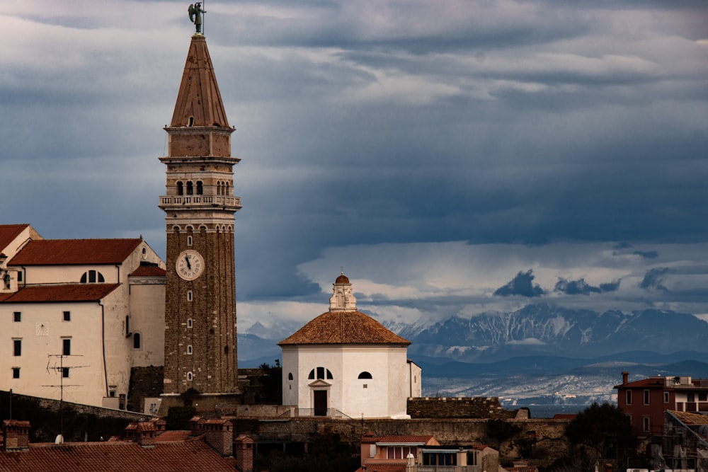 a tall clock tower towering over a city