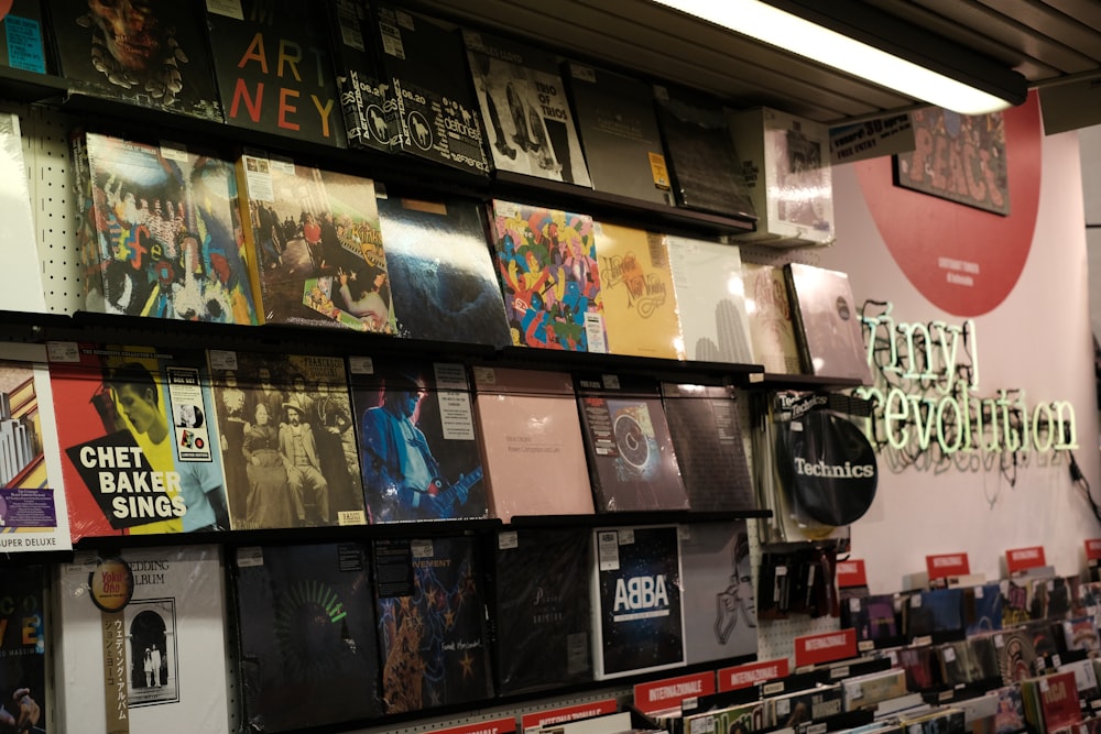 a wall of records and cds in a store