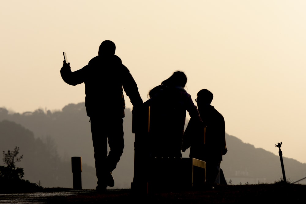 a group of people standing next to each other