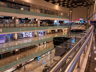 a large building with a bunch of escalators in it