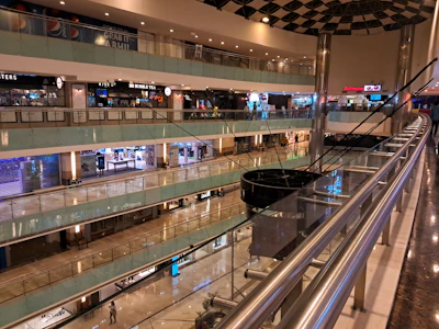 a large building with a bunch of escalators in it