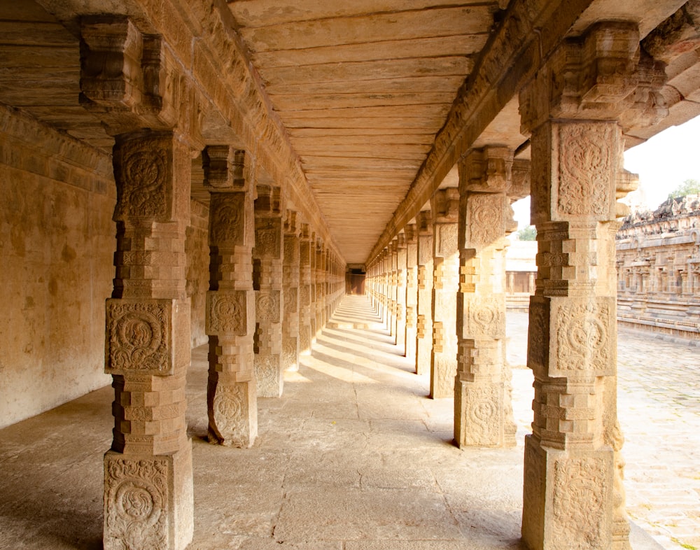 a long line of pillars in a building