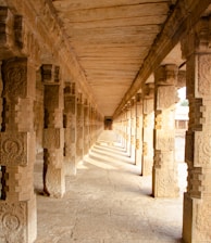 a long line of pillars in a building