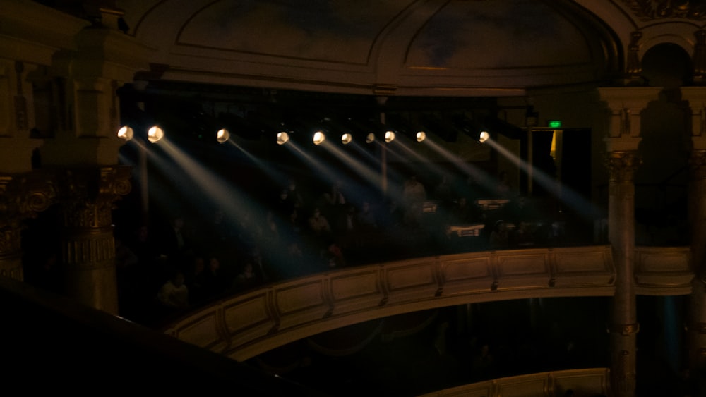 a group of people standing on top of a stage