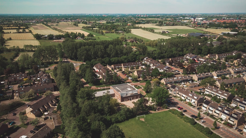 an aerial view of a residential area with lots of trees