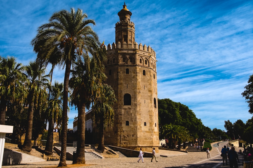 a tall tower with a clock on the top of it