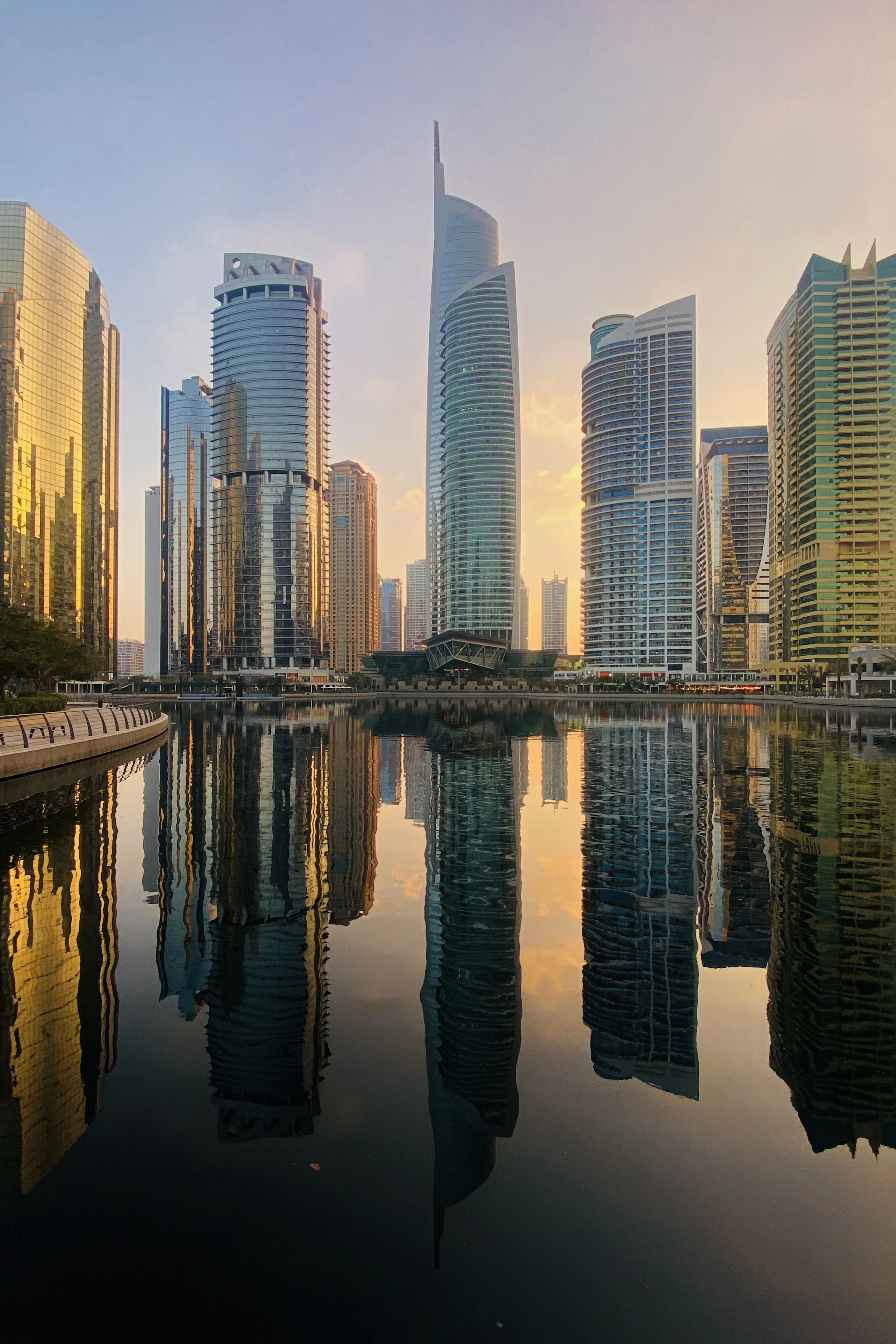 Jumeirah Lake Towers reflected in the lake at sunset