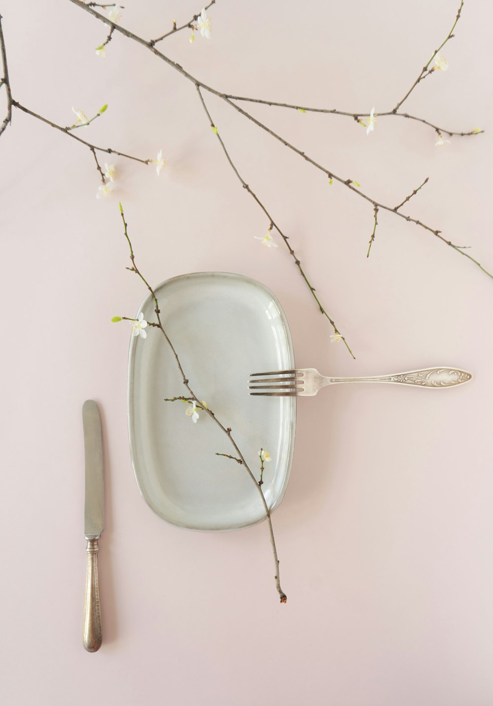 a fork and a plate on a table