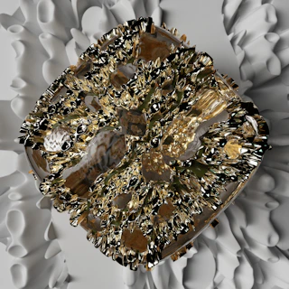 Highly abstract, intricate compass design illuminated with subtle platinum gold highlights on a charcoal background.