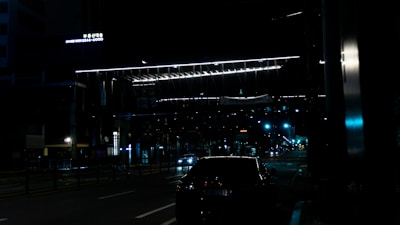 Urban infrastructure project at dusk showing Korean safety fences and signage with a calm blue tone.