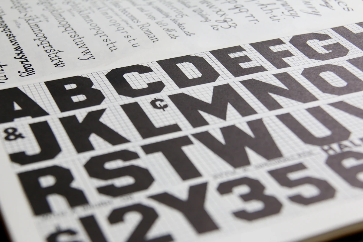 Grid-ruled type specimen sheet showing a grotesk alphabet at multiple weights