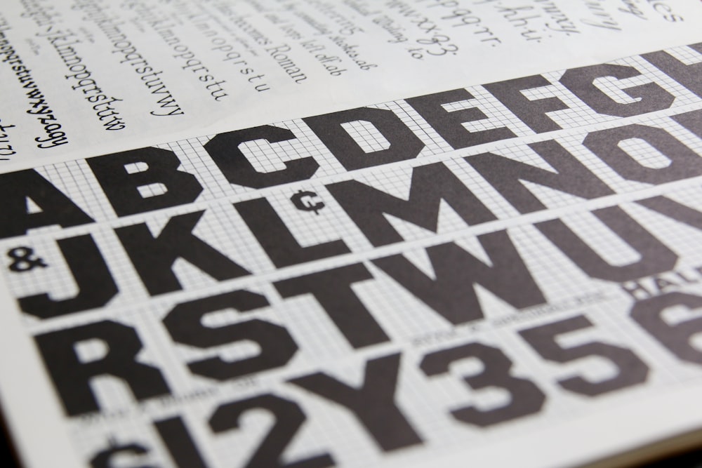 a close up of a book with letters and numbers
