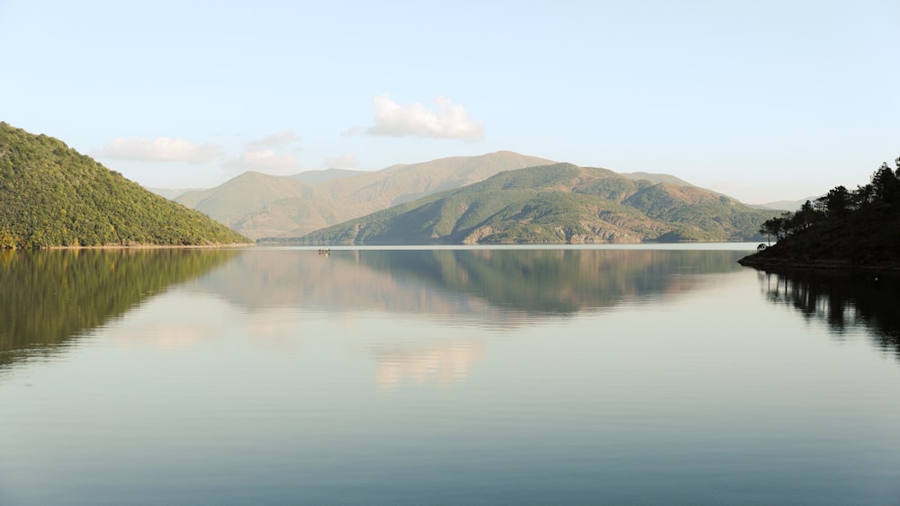 a large body of water surrounded by mountains