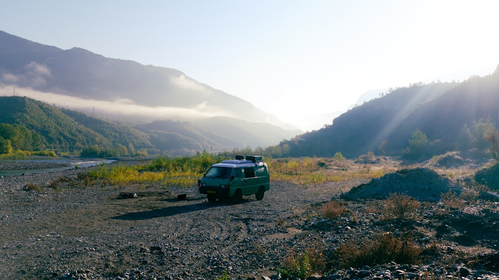 a van is parked on the side of the road