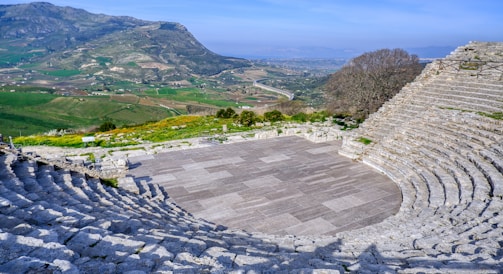 a stone amphit with a view of a valley