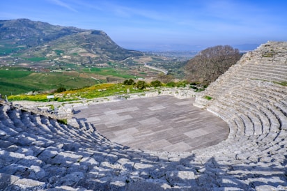 a stone amphit with a view of a valley