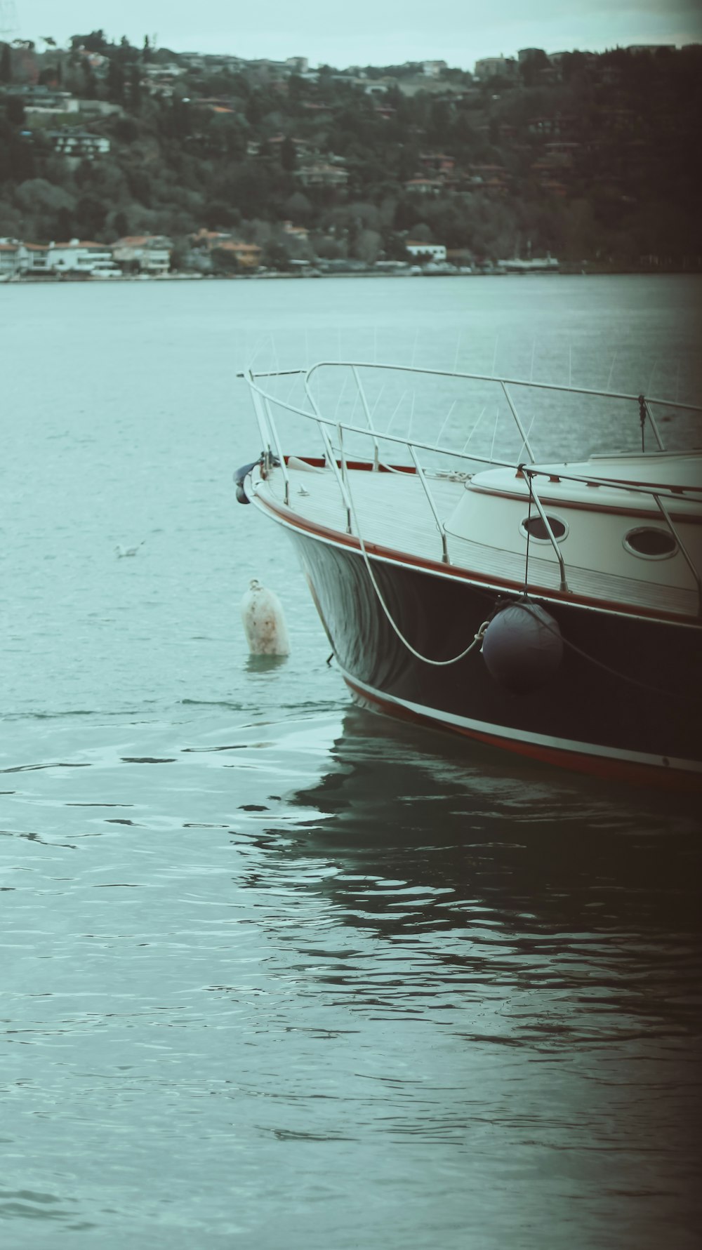 a large boat floating on top of a body of water