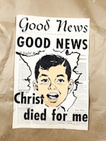 a newspaper with a picture of a man's face on it