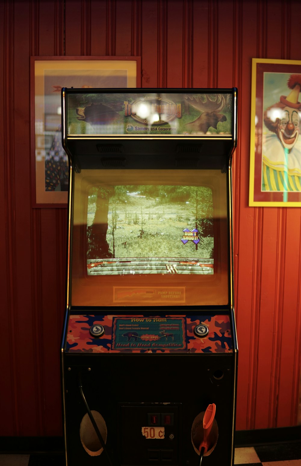 an old fashioned arcade machine in a room
