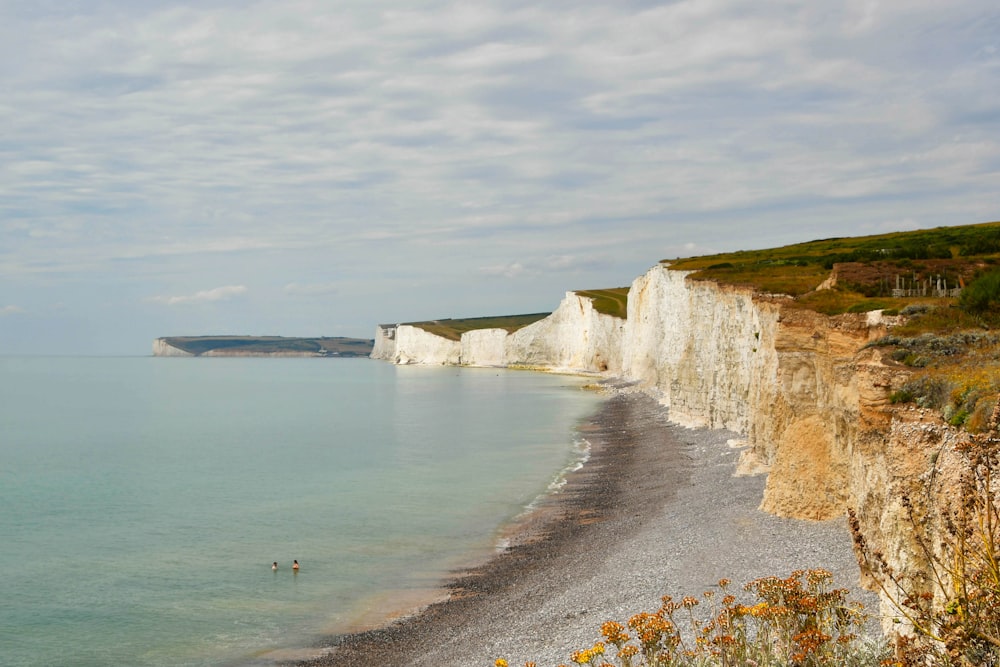 a view of the white cliffs of the beach