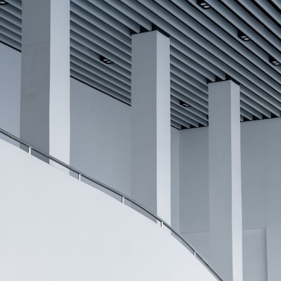 a close up of a building with a curved ceiling