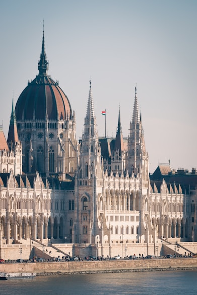 a large building with a flag on top of it