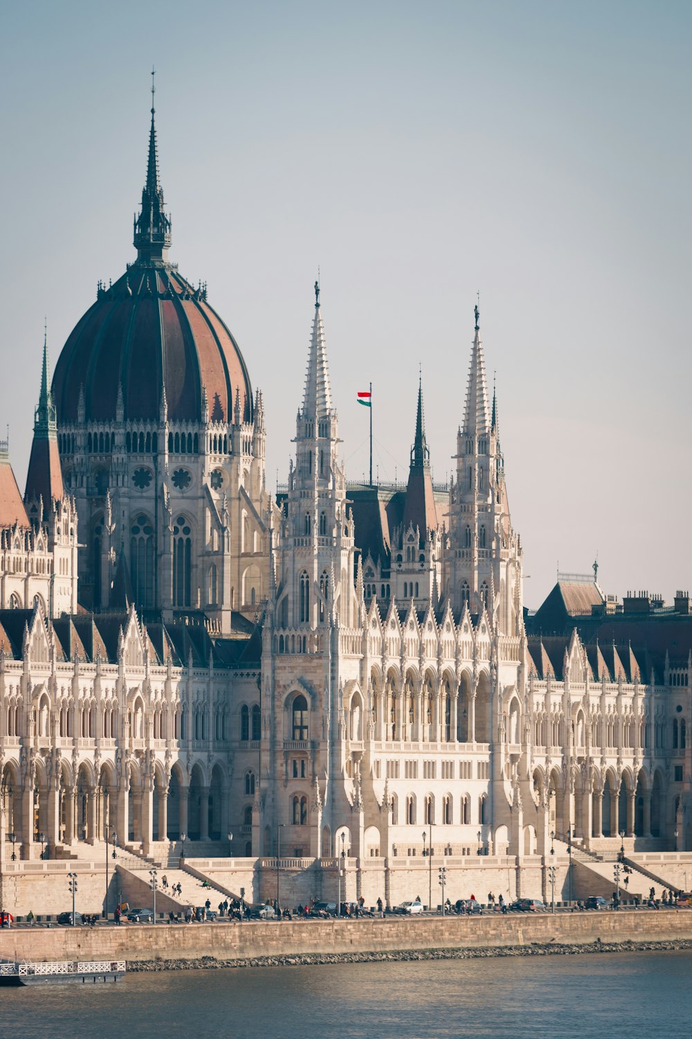 a large building with a flag on top of it