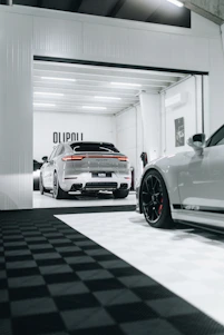 A clean, modern garage floor freshly coated with glossy epoxy, showcasing a professional finish in a bright Albury home.