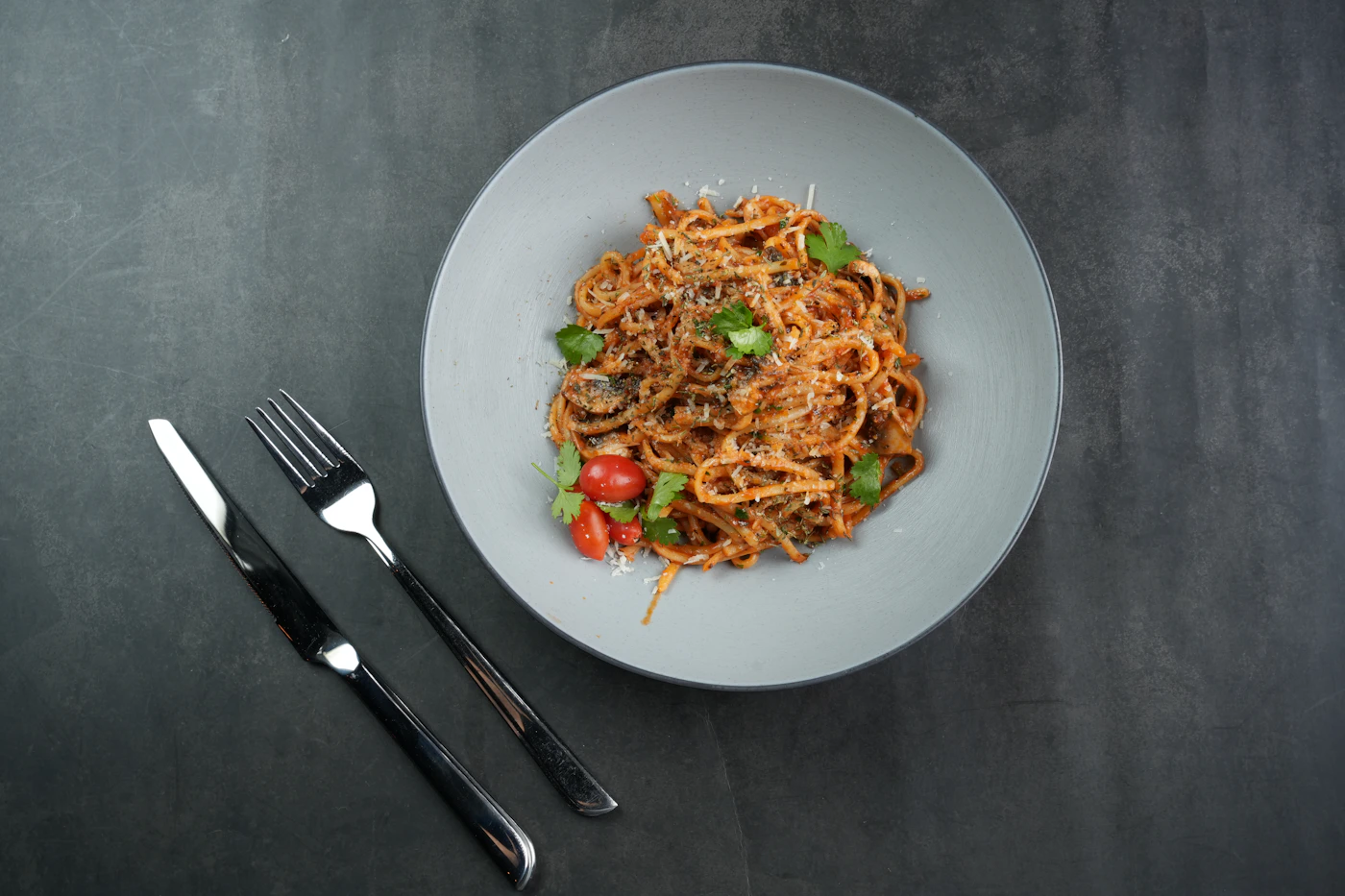 Traditional Italian pasta with tomato and basil