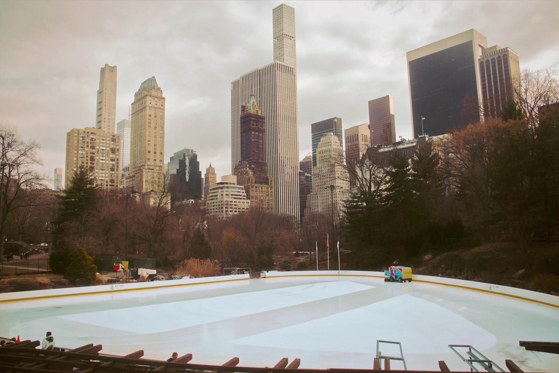 woman wearing yellow long-sleeved dress under white clouds and blue sky during daytime
