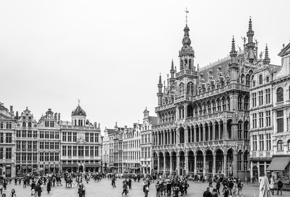 a black and white photo of a city square