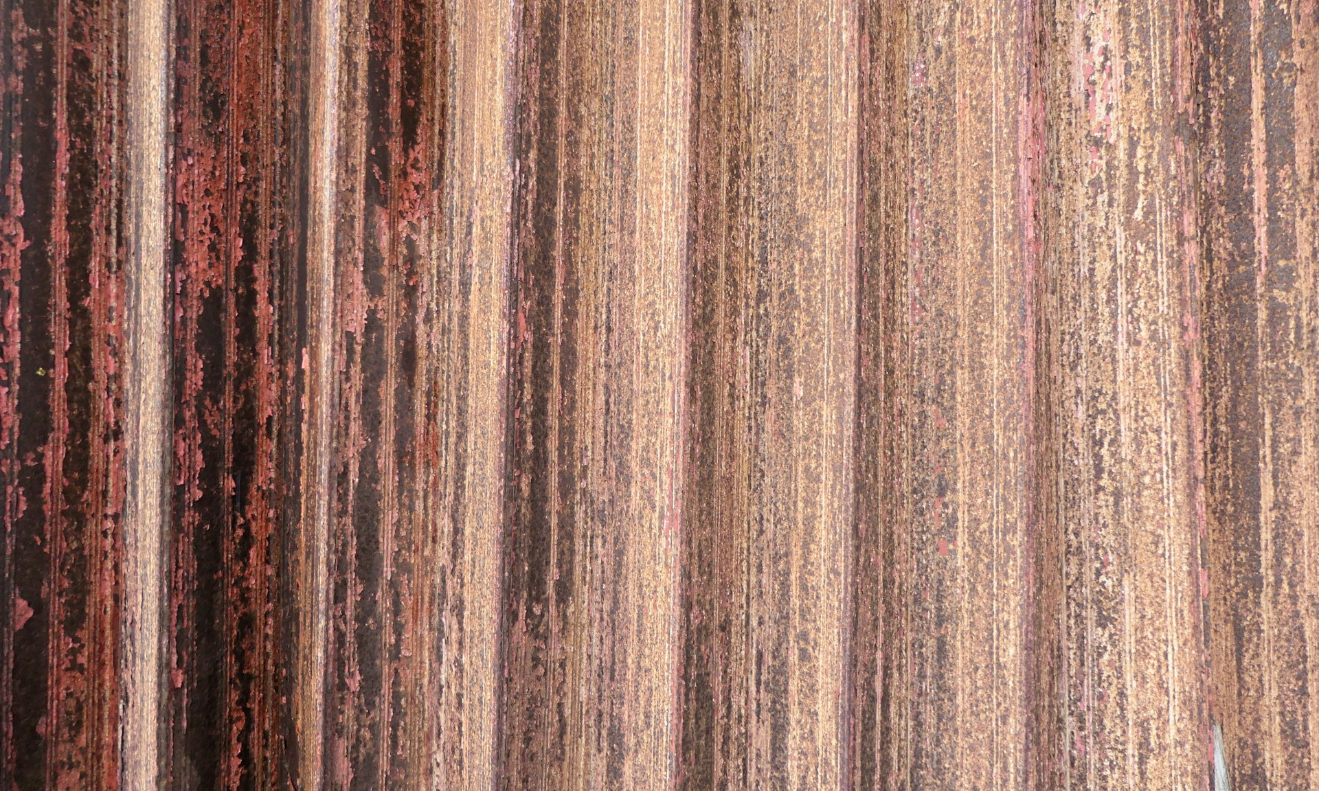 an abstract photograph of brown and pink stripes