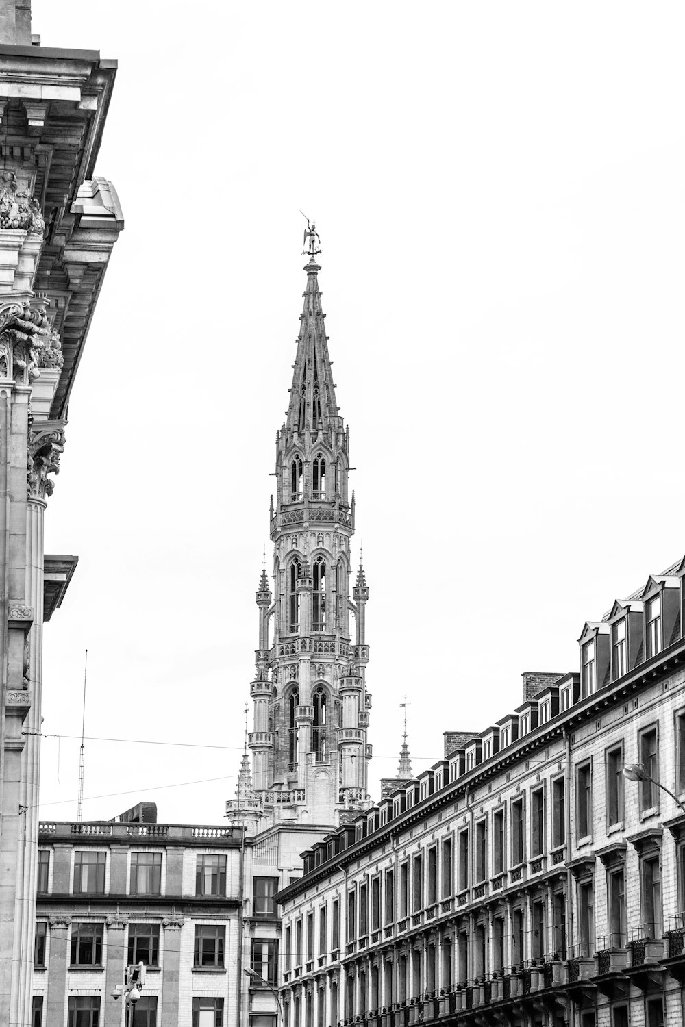 a black and white photo of a clock tower