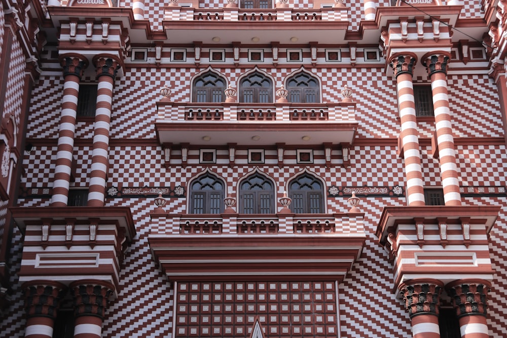 a very tall building with a clock on the side of it