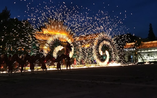A vibrant image of a magic and fire show performance.