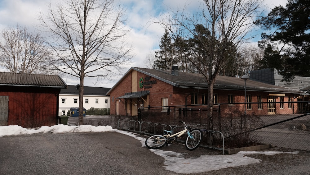 a bike is parked in front of a building