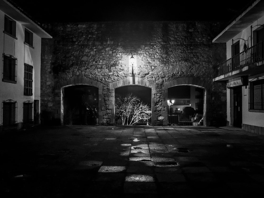 a black and white photo of an entrance to a building