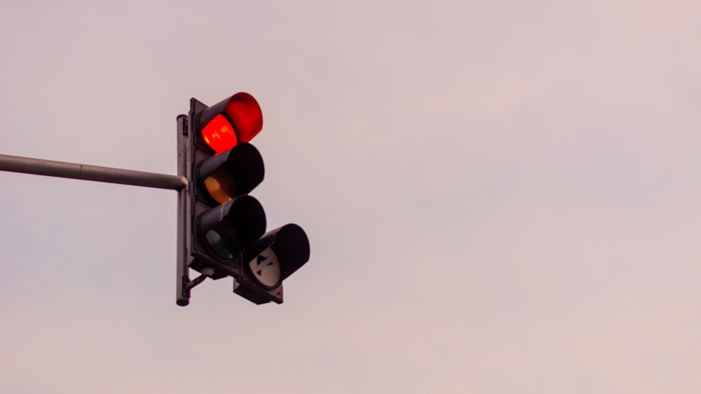 a traffic light with a sky background