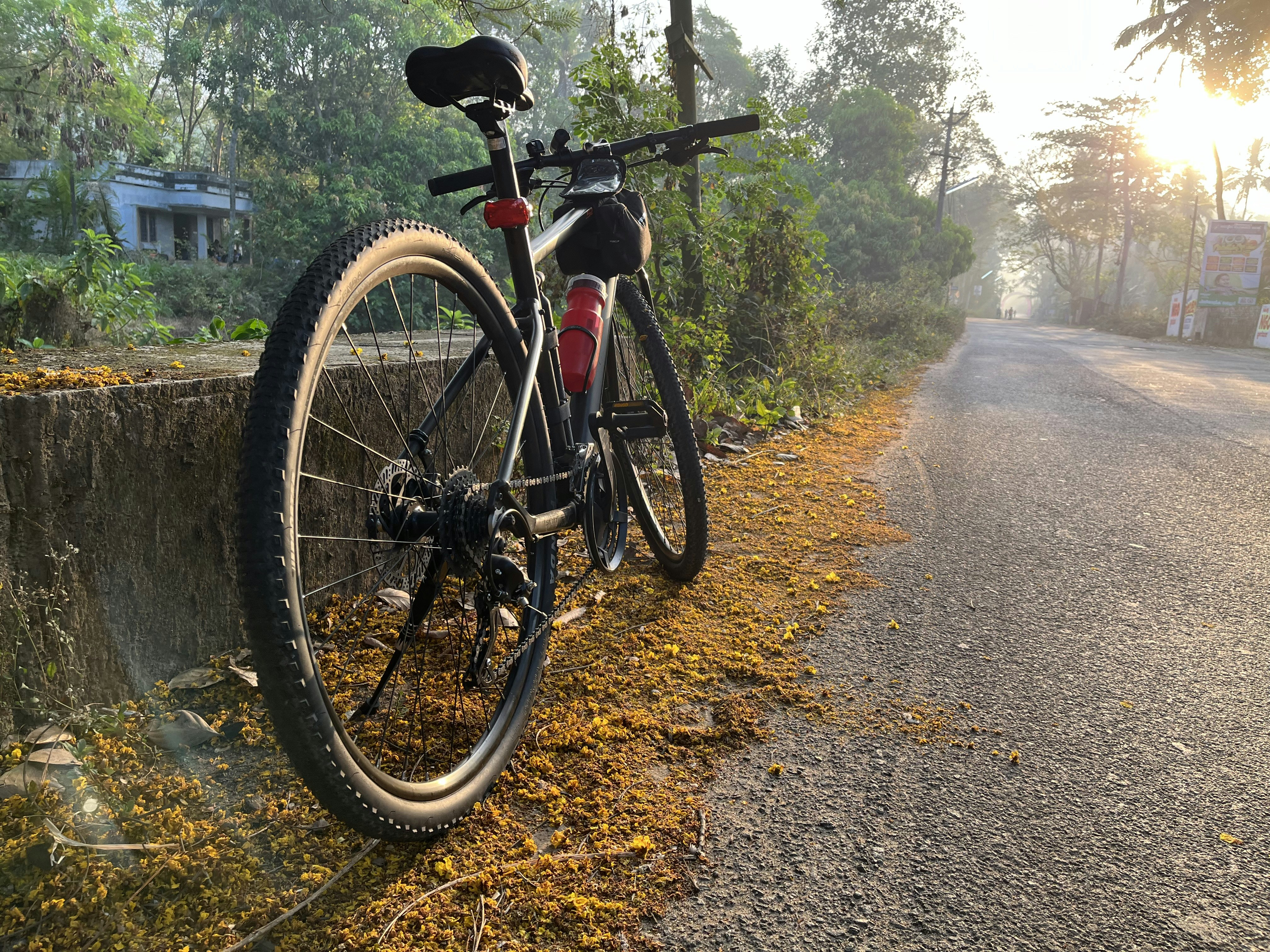 a bicycle parked on the side of a road