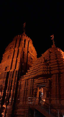 The grand facade of Ayodhya's Ram Mandir glowing under soft evening lights.