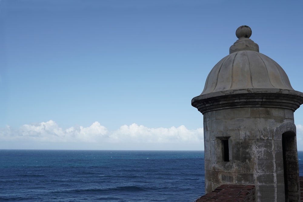 a view of the ocean from the top of a building