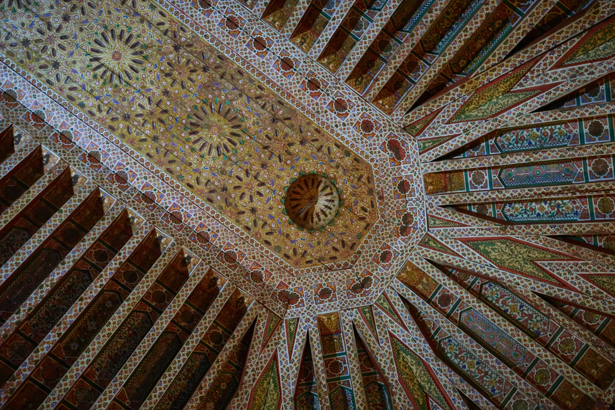 Intricately painted ceiling at the Bahia Palace in Marrakech